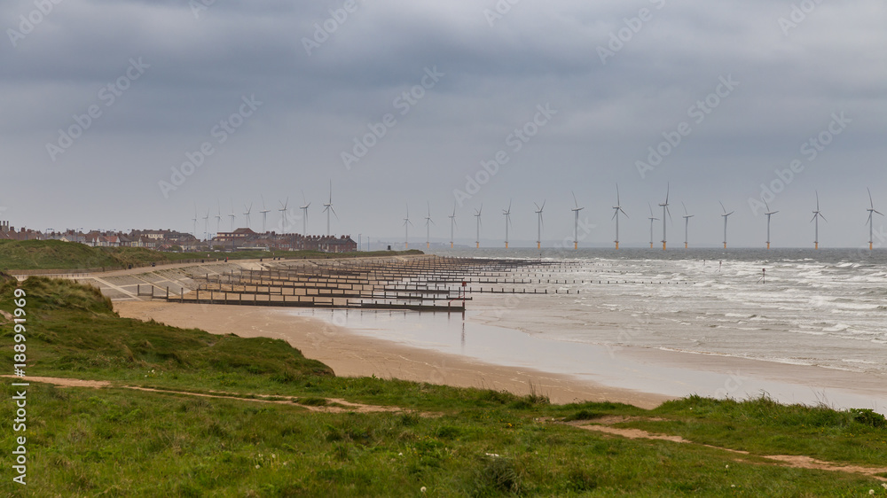 Stray Beach near Redcar and Wind turbines at the North Sea Coast, Redcar and Cleveland, UK