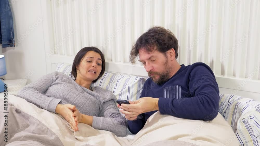 Man reading text message of lover of wife angry Man reading text message of lover of wife angry