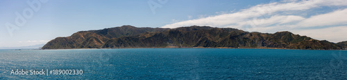 Wild landscape  shot from the top deck of a ferry  travelling from Wellington to Picton  New Zealand.