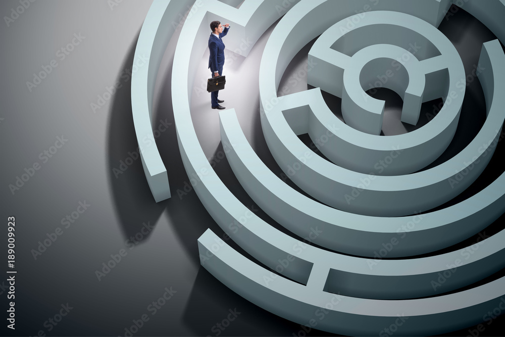 Businessman is trying to escape from maze labyrinth Businessman is trying to escape from maze labyrinth