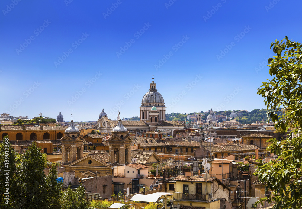 The domes and rooftops of the eternal city, the view from the Spanish steps. Rome, Italy