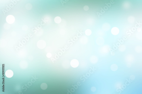 Abstract blue background with bokeh light effect.