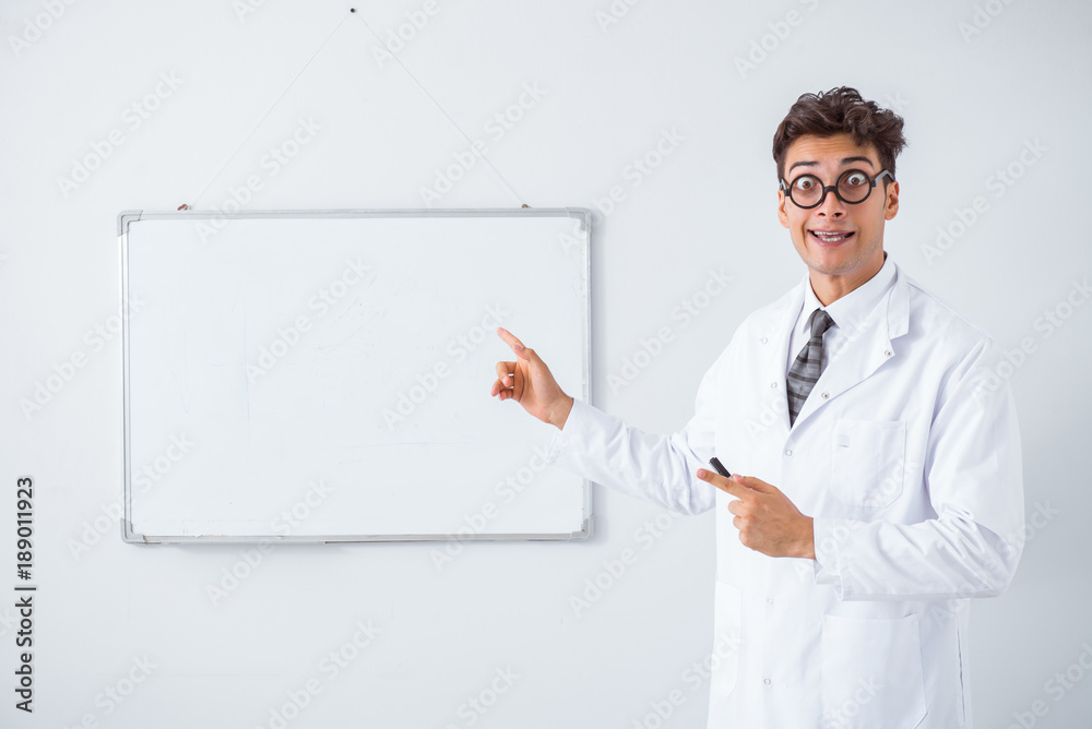 Funny doctor scientist making presentation in hospital Funny doctor scientist making presentation in hospital