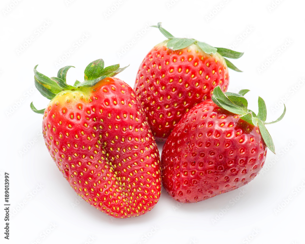 ripe strawberries isolated on white