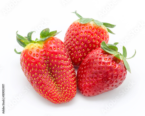 ripe strawberries isolated on white