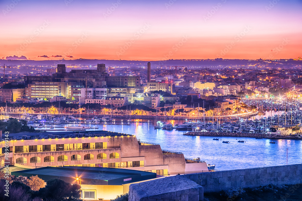 Malta: Il-Gzira and Marsans Harbour. Aerial view from city walls of Valletta at sunset