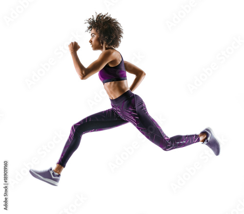 Young african girl running in silhouette on white background. Dynamic movement. Side view