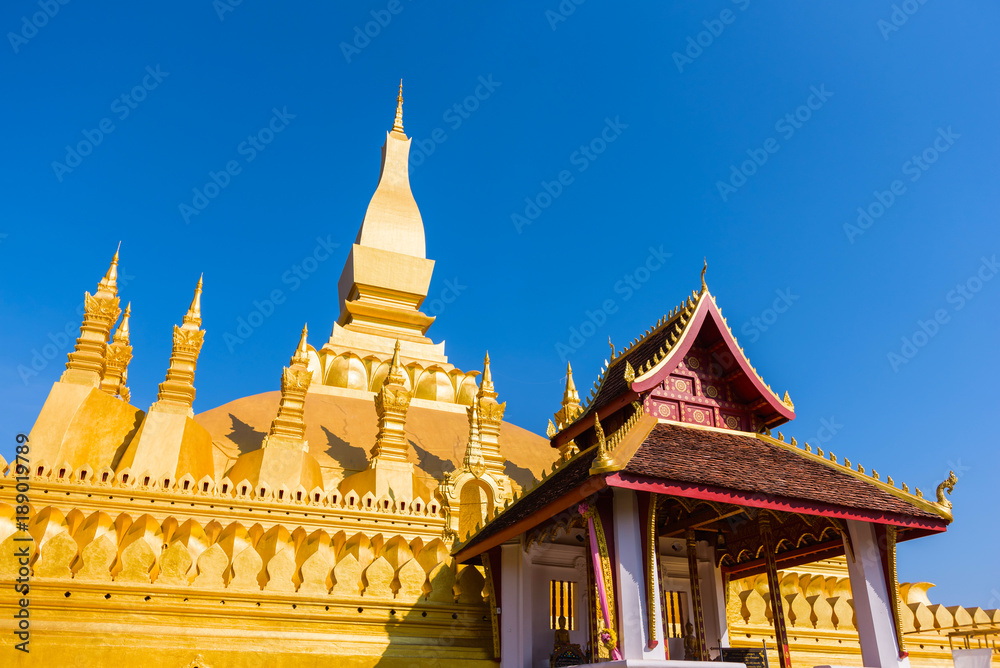 Fototapeta premium VIENTIANE, LAOS - JANUARY 19, 2018: Wat Phra That Luang, One of the Most Sacred Temples in Vientiane,Religious architecture and landmarks of Vientiane, Laos