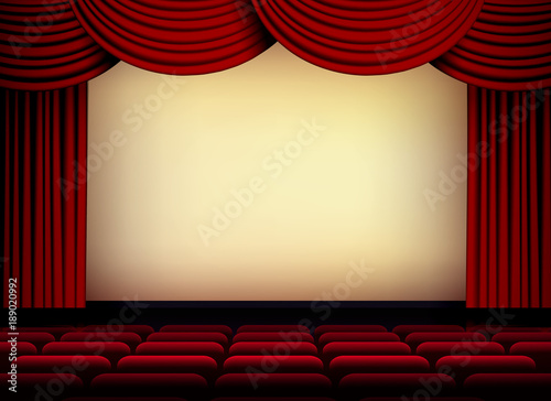theater or cinema auditorium screen with red curtains and seats