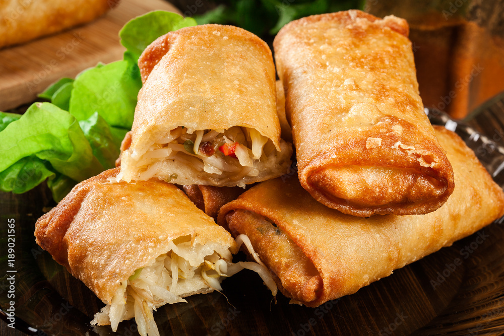 Spring rolls with chicken and vegetables served with sweet chili sauce or soy sauce