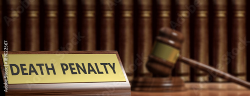 Fotografie Death penalty text and a judge gavel. 3d illustration