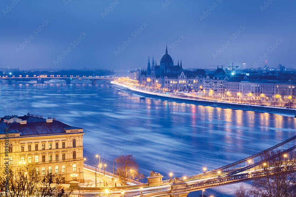 Danube river in Budapest. Winter night, ice floes