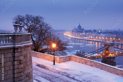 Promenade at Royal Palace, Lantern, river view with Parliament outline. Budapest © Yury Kirillov