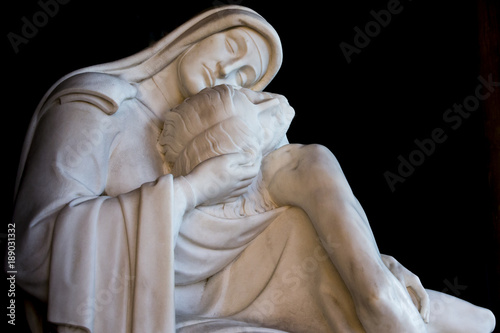 More than 100 years old religious statue Madonna and Christ (compassion)
