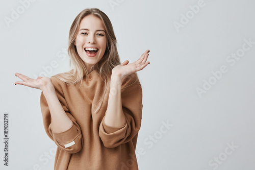 Photography Pretty beautiful woman with blonde long hair looking at camera having excited an
