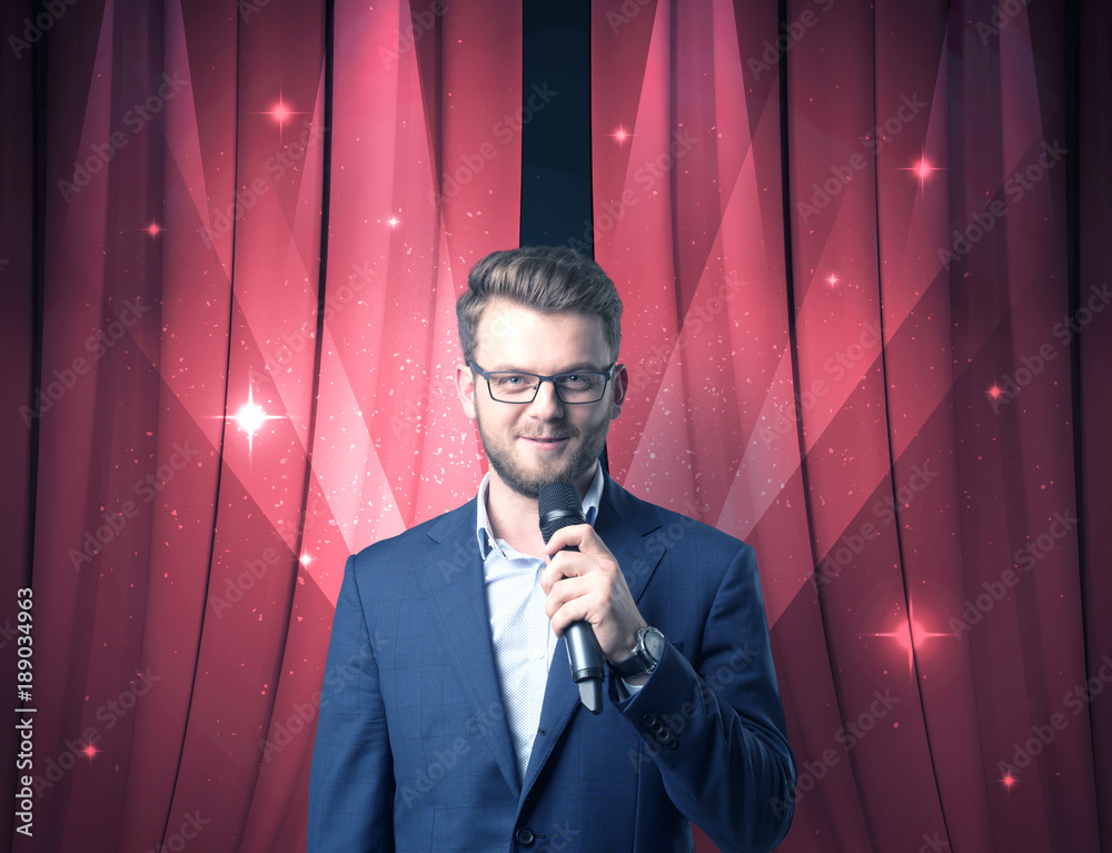 Businessman holding microphone Businessman holding microphone