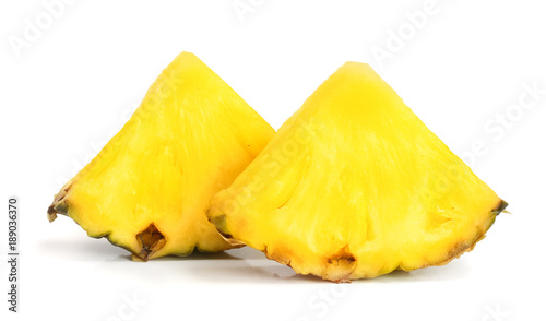 two pineapple slices isolated on white background