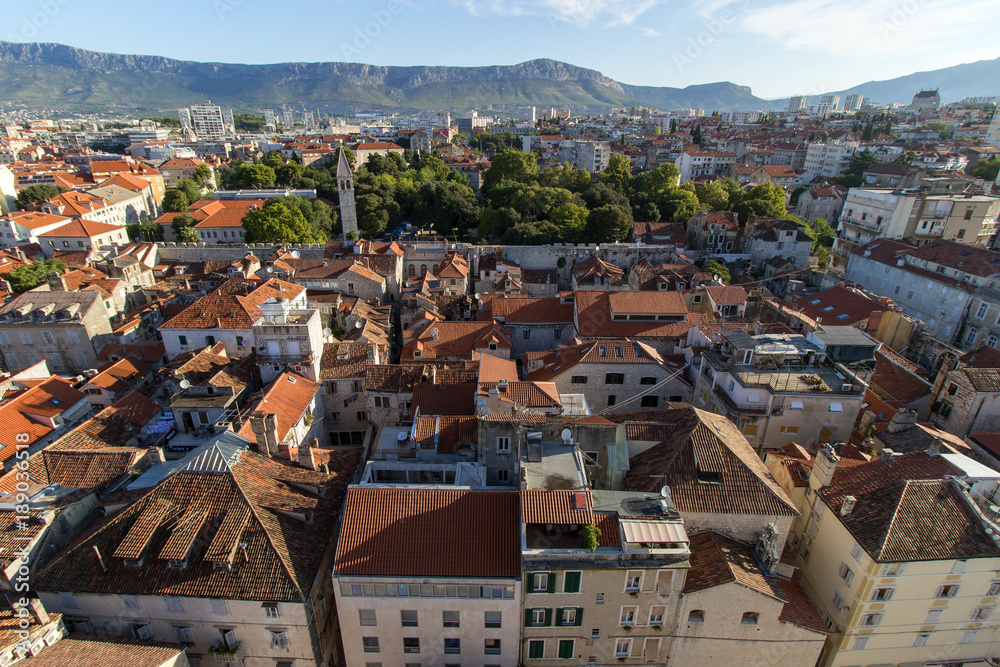 Split's historic Old Town and beyond in Croatia viewed from above on a sunny day.