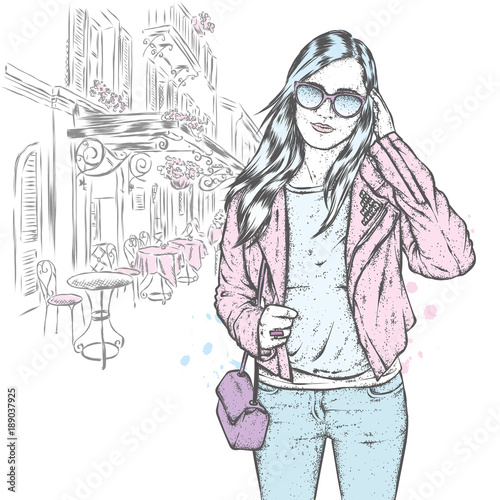 A beautiful girl with long hair in a leather jacket with thorns and in shorts. Vector illustration for a postcard or a poster  print for clothes. Fashion and style  clothing and accessories.