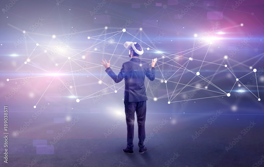 Businessman with vj glasses and linking concept