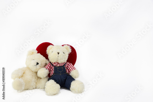 Bear doll with red heart isolate on white backgorund, Valentine concept © Danai