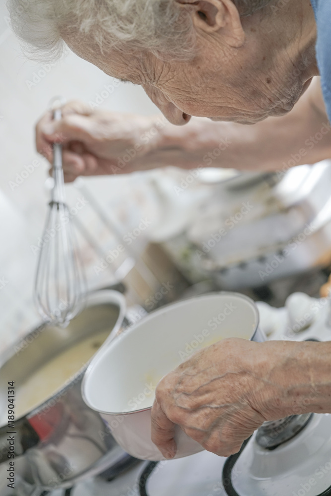 Healthy senior woman preparing food