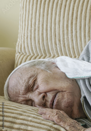 Senior woman sleeping on sofa © berna_namoglu