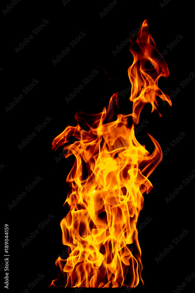 Fire flame isolated on black isolated background - Beautiful yellow, orange and red and red blaze fire flame texture style. Fire flame isolated on black isolated background - Beautiful yellow, orange and red and red blaze fire flame texture style.