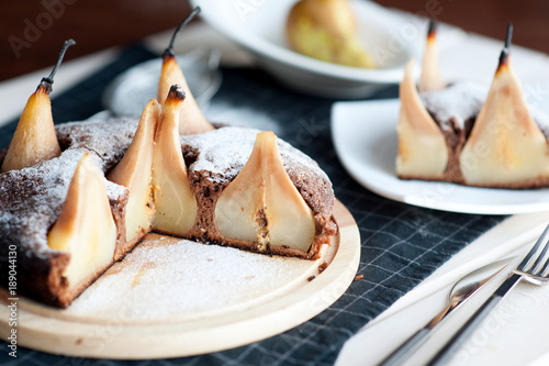 Homemade chocolate cake with pears photo