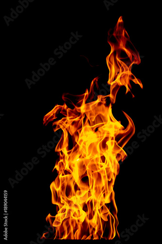 Fire flame isolated on black isolated background - Beautiful yellow, orange and red and red blaze fire flame texture style.