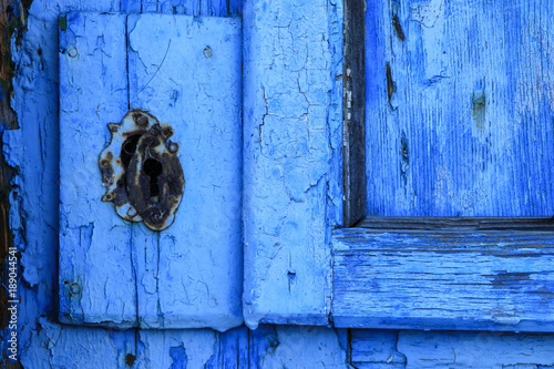 Detail from a old rustic blue door