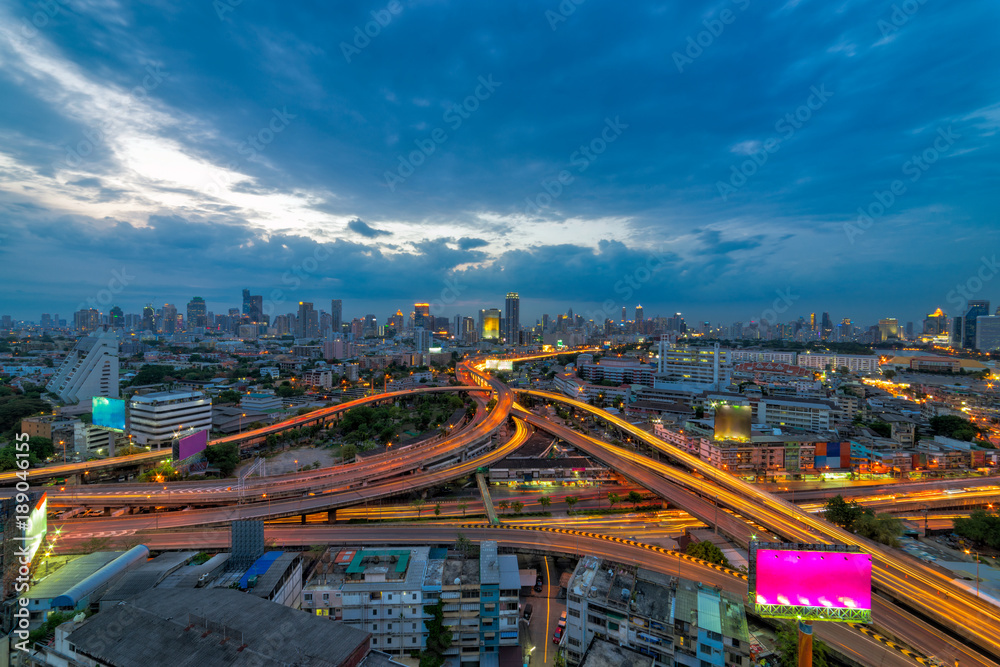 Fototapeta Bangkok business district Expressway and Highway top view, Thailand at sunset