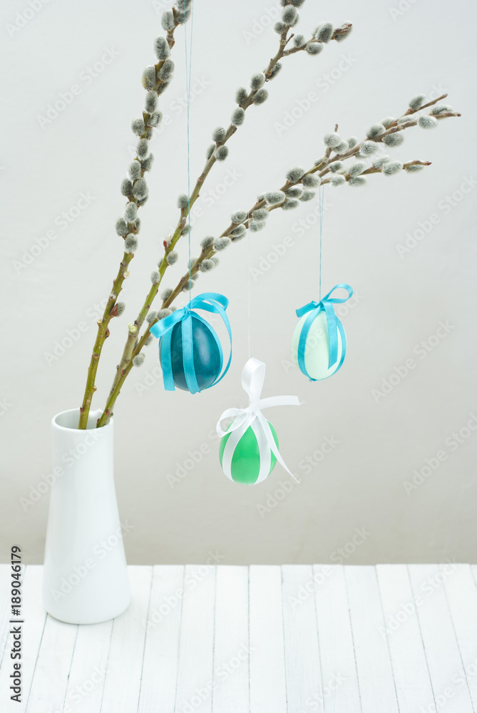hanging easter eggs on pussy willow twigs