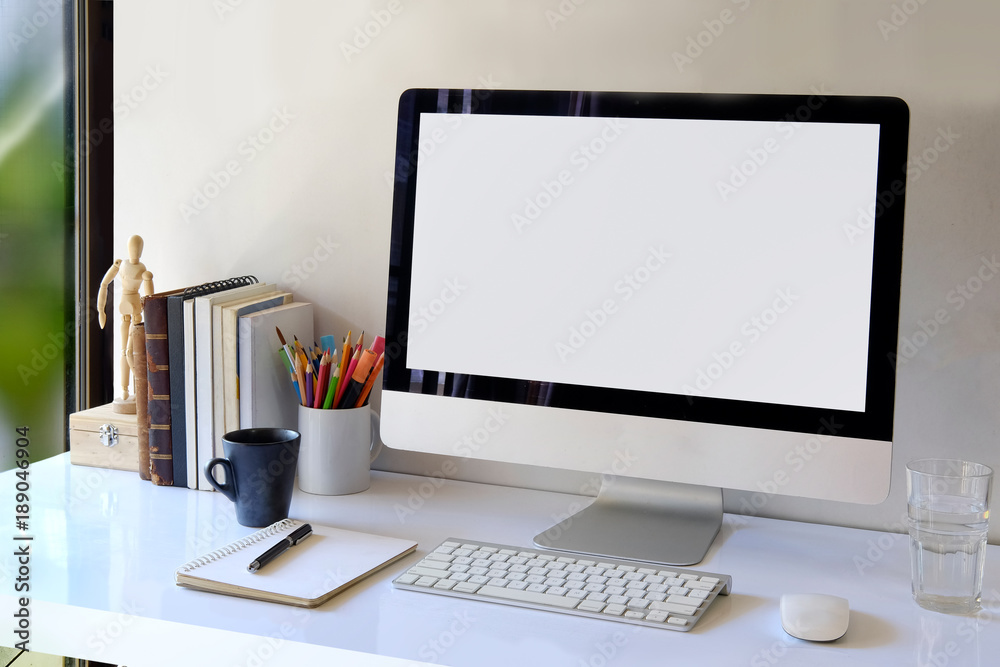 Fototapeta premium Workspace mockup with desktop computer and office supplies.