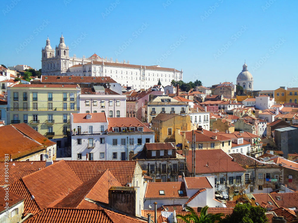 Panoramic view of the city, houses and pot tile roofs from Miradouro das Portas do Sol Lisbon, Portugal