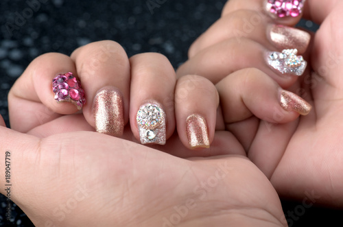 Asian young girl homemade fasion nail by oneself.