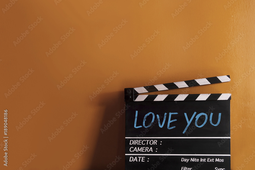 Love you text title on film slate