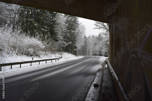 verschneite Strasse und Unterführung unter Nürburgring, Quiddelbach photo