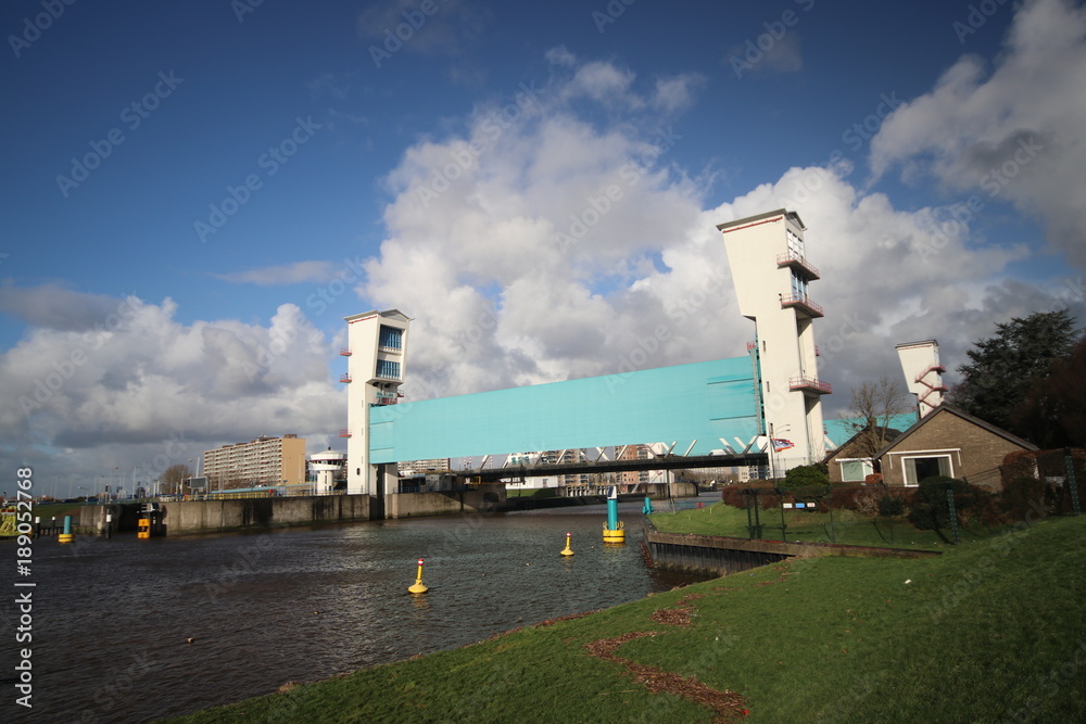 The Algerakering, large water barrier to protect the land below sealevel behind it in Krimpen aan den IJssel, The Netherlands The Algerakering, large water barrier to protect the land below sealevel behind it in Krimpen aan den IJssel, The Netherlands