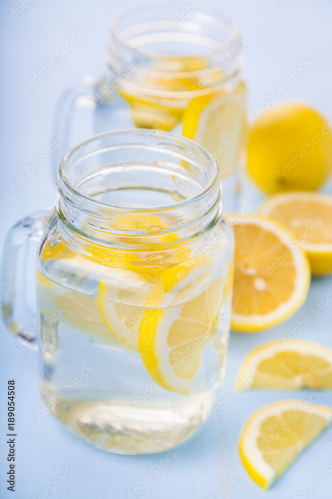 Refreshing ice cold water with lemon Refreshing ice cold water with lemon