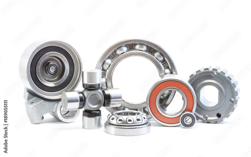 Bearing, rollers and gear parts isolated on white, automotive industry Bearing, rollers and gear parts isolated on white, automotive industry