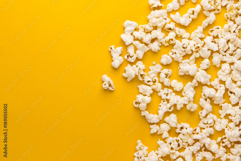 popcorn on a yellow popcorn on a yellow