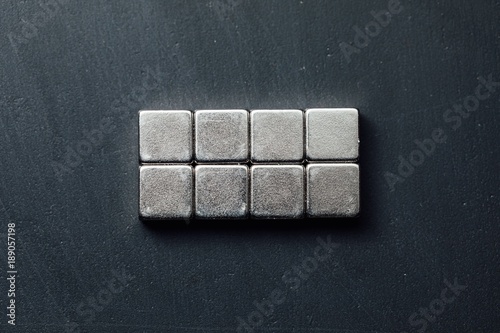 neodymium magnets squares, black background photo