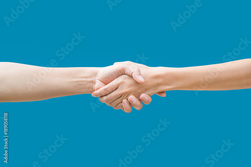 woman shaking hands isolated on blue background including with clipping path.