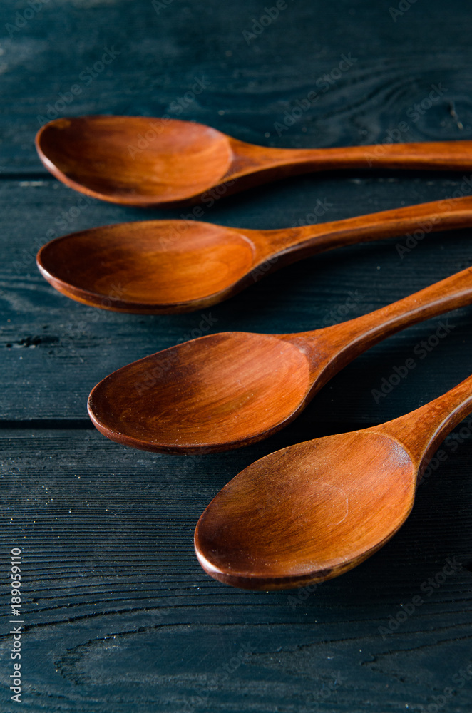 Wooden spoons arranged on table