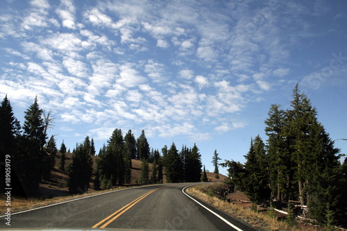 Road in the Crater Lake National Park in a sunny day, Oregon, USA