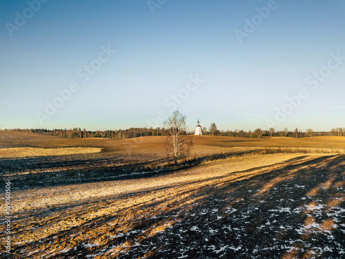 Drone Photography of a Sunny Winter Day of Partly Snowy Fields
