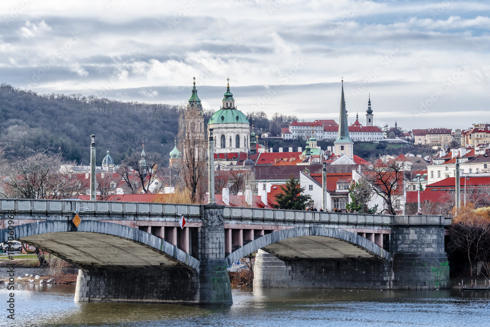 Fototapeta premium Clouds over the river Vltava