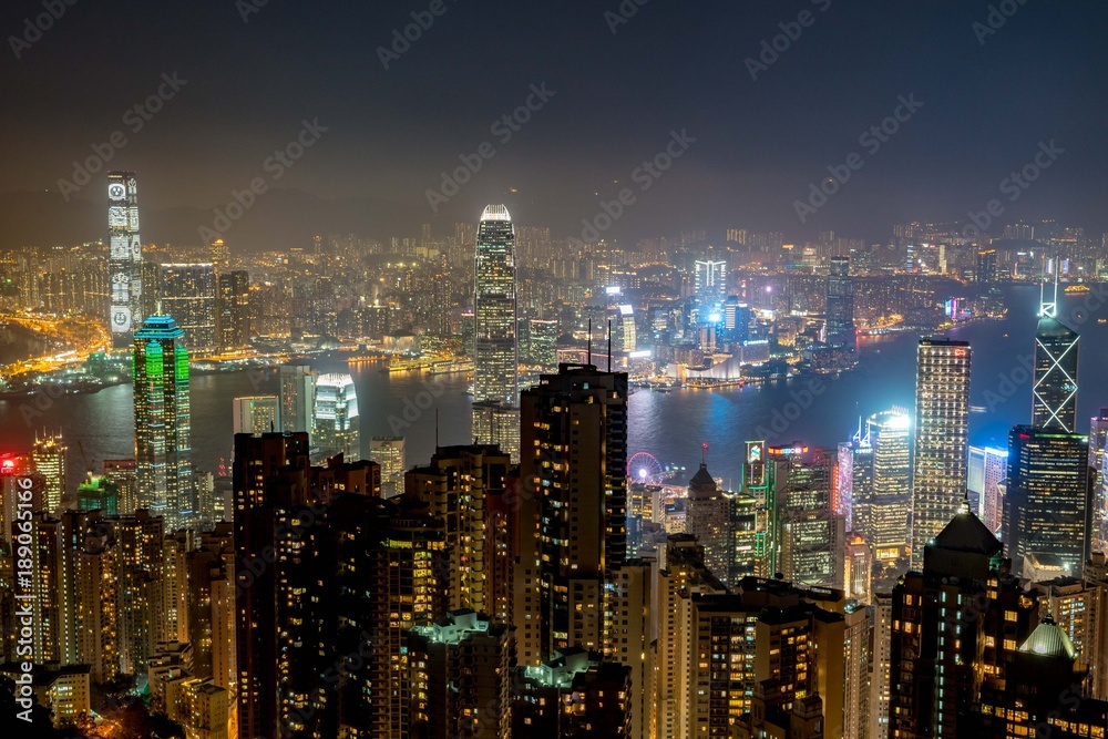 Hong Kong tower on sundown bird eye view from kowloon at victoria peak tower the famous view point of hongkong Hong Kong tower on sundown bird eye view from kowloon at victoria peak tower the famous view point of hongkong