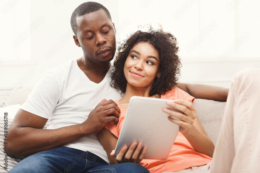 Balck couple making order at food delivery web site, online order Balck couple making order at food delivery web site, online order